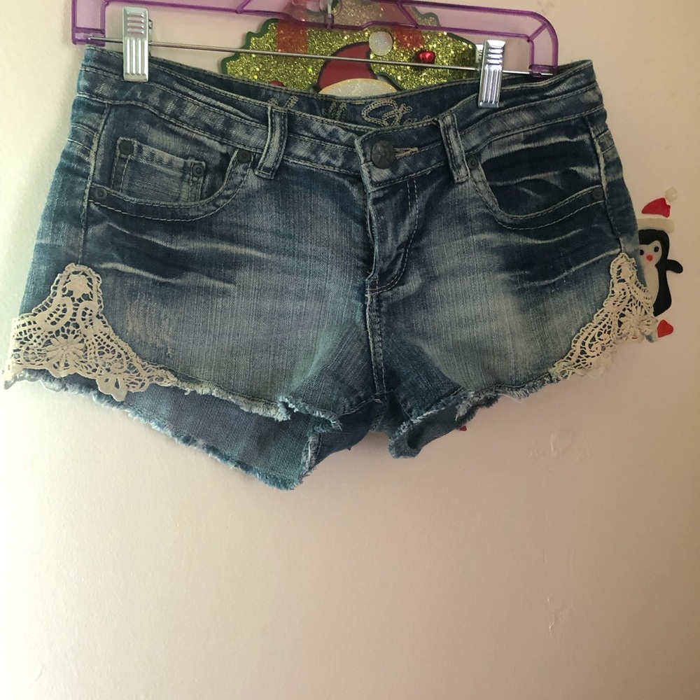 Lace accented jean shorts